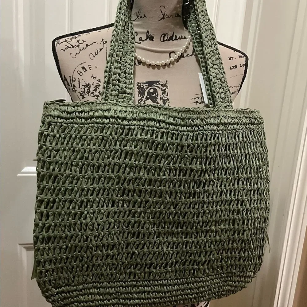 The Last Straw Fringe Straw Tote Bag. In Olive
